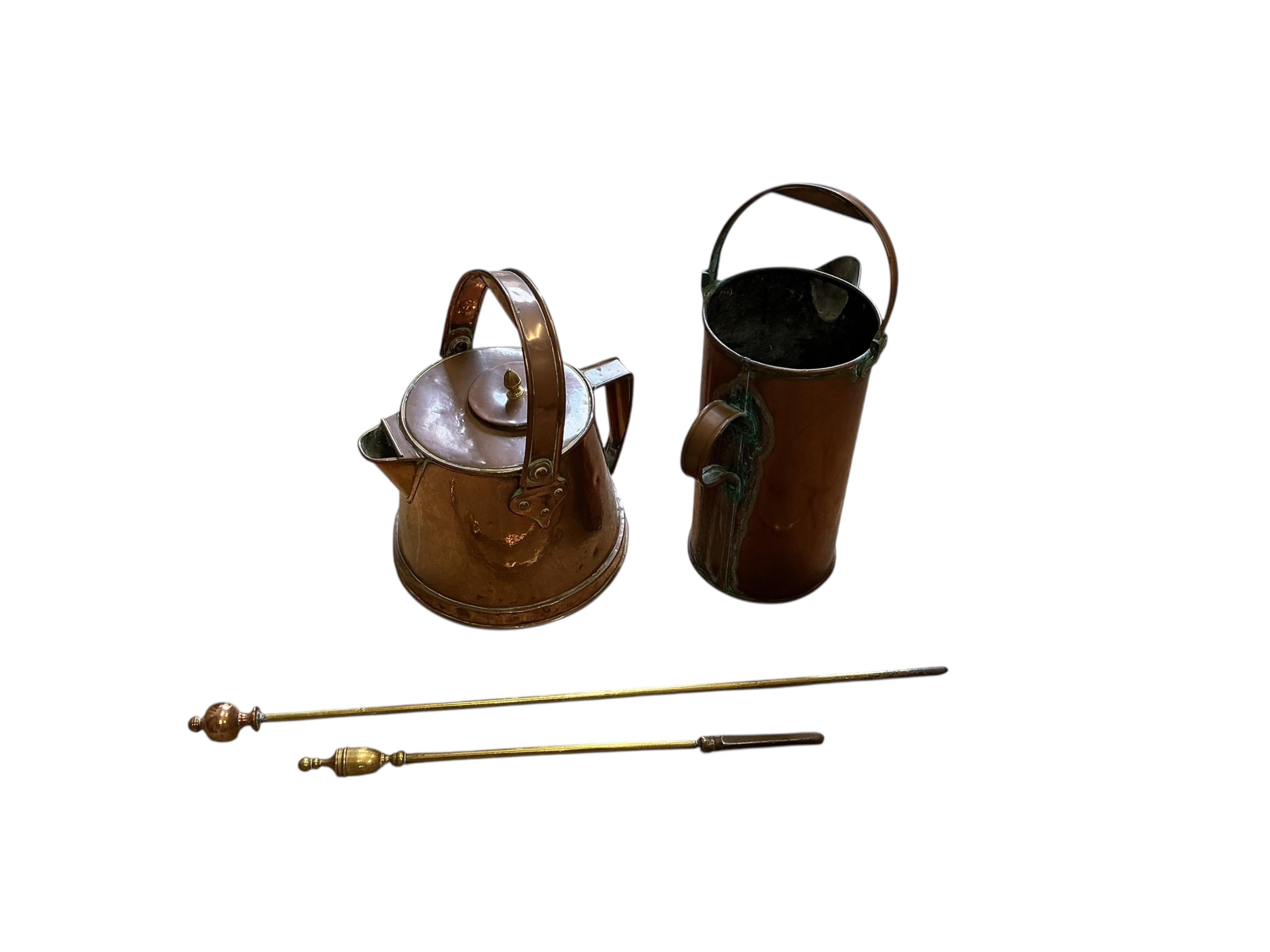 A Victorian copper kettle, a spouted bucket, two fire irons and a copper fender